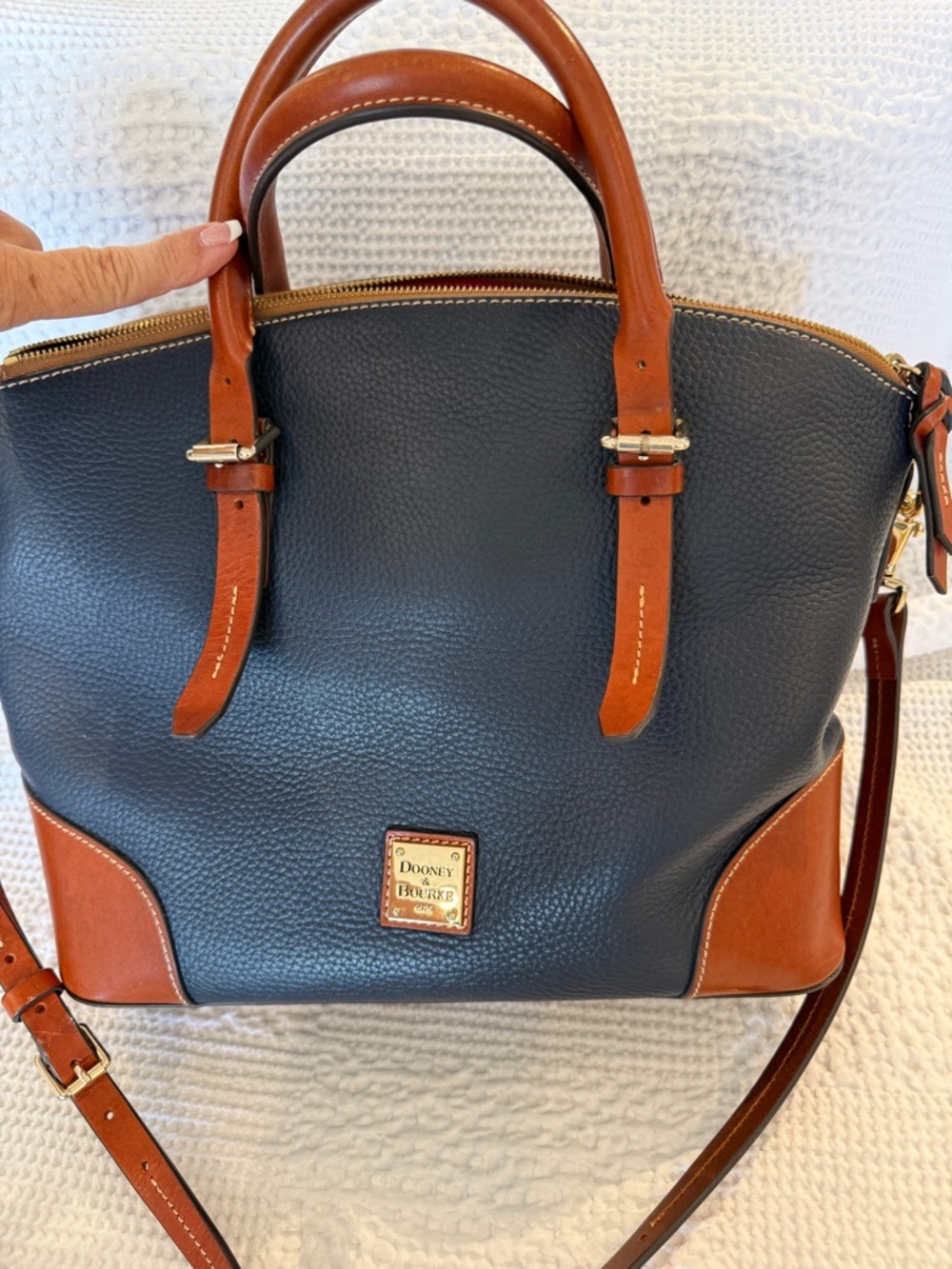 Dooney & Bourke Navy and Brown Leather satchel.